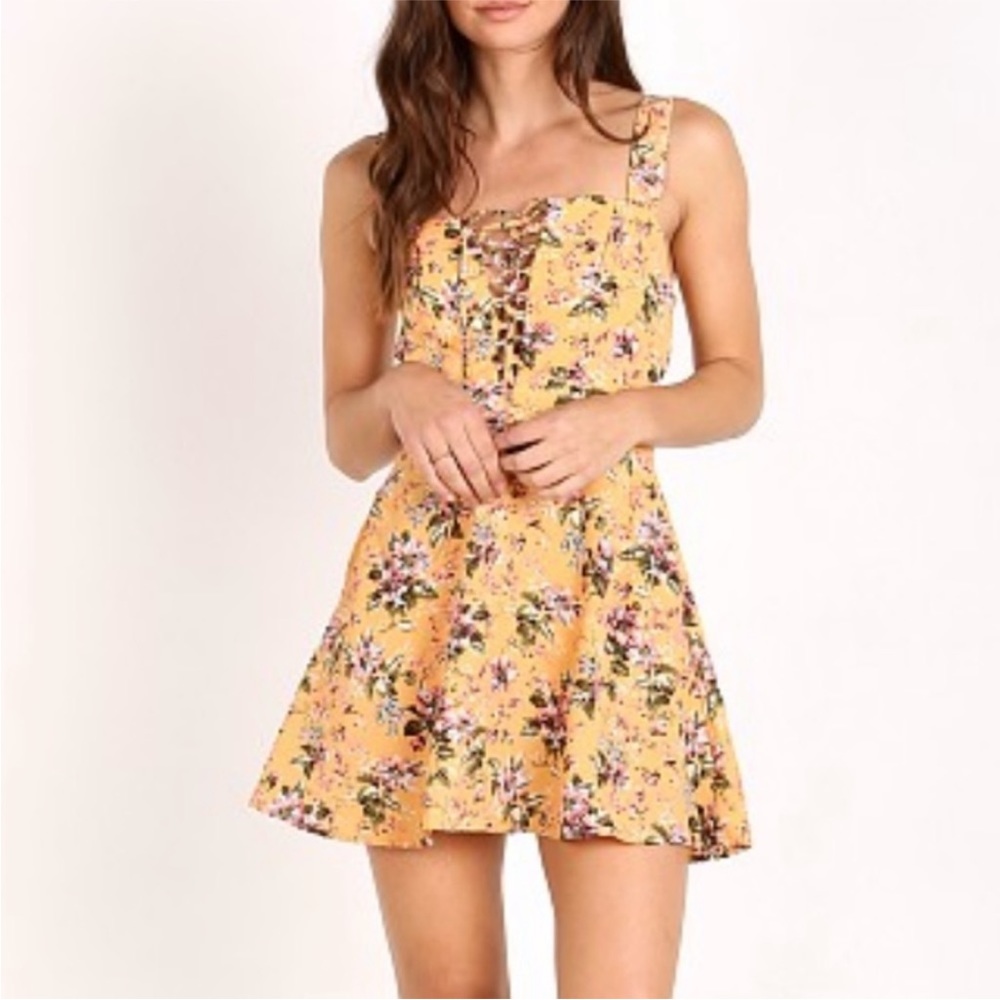 Flynn Skye Leila Lace Up Mini Dress in color ‘Squash Blossom’